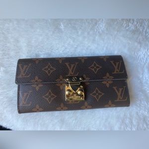 LV clasp wallet